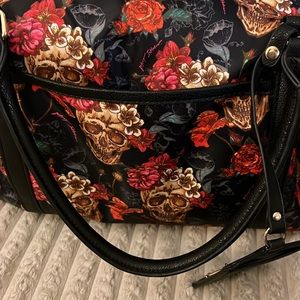 Betsey Johnson floral skull weekender bag